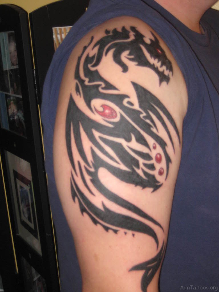 Shoulder tattoo tribal dragon Dragon Tattoos