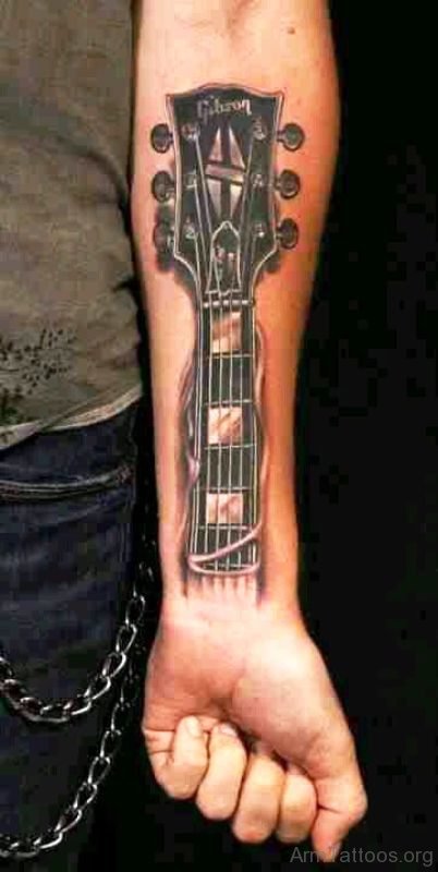 Adorable Guitar Tattoo On Arm 