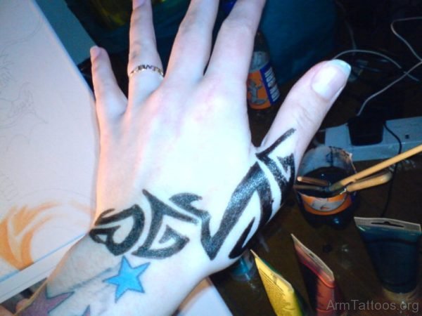 Amazing Black Tribal Tattoo On Left Hand