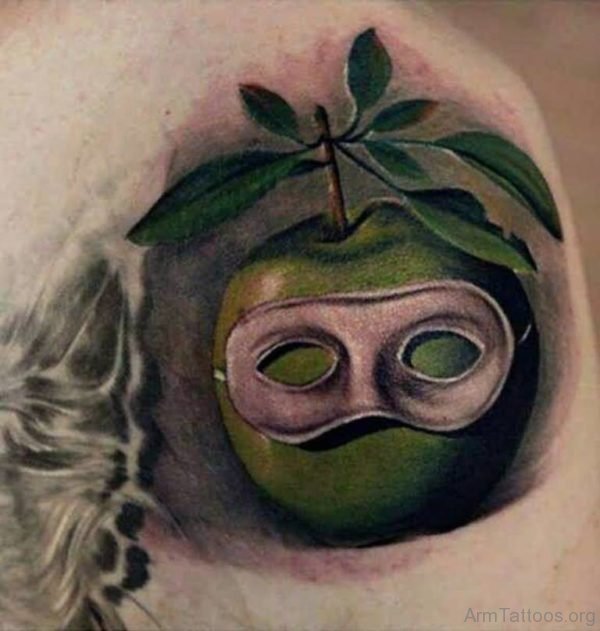 Amazing Green Apple Mask Tattoo On Arm 