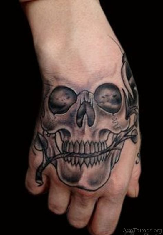 Amazing Grey Ink Skull Tattoo On Hand