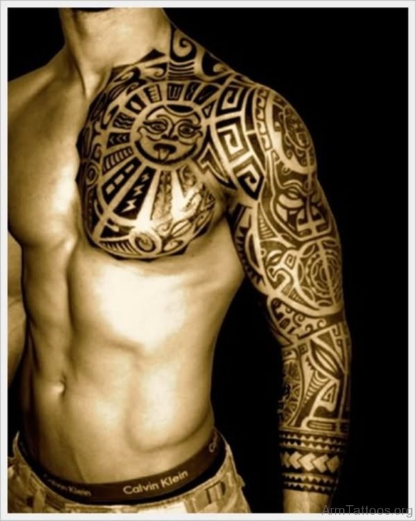 Amazing Tribal Design Tattoo On Left Full Sleeve And Chest