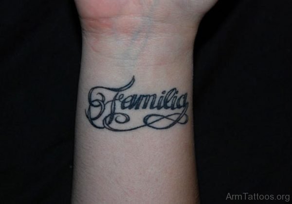 Ambigram Family Word Tattoo On Wrist