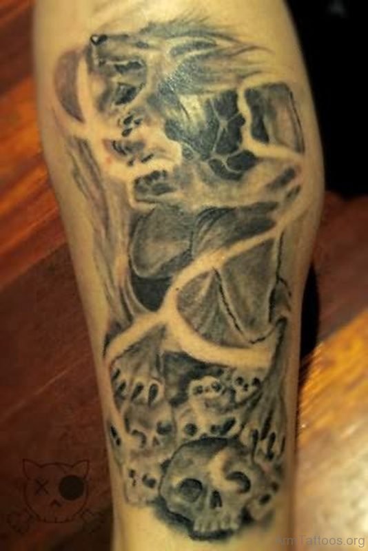 Angry Wolf Graveyard Tattoo On Arm