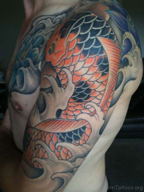 Attractive Fish Tattoo On Left Shoulder 