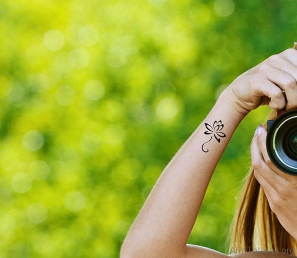 Attractive Lotus Tattoo On Arm 