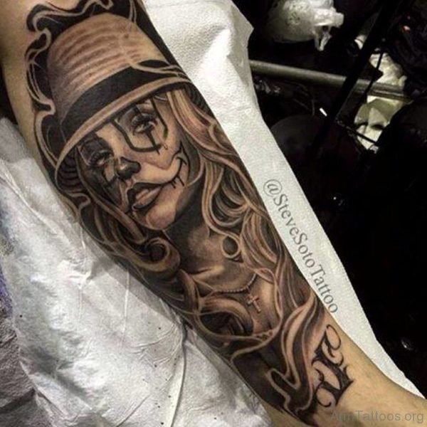 Awesome Girl Face Tattoo on Arm 