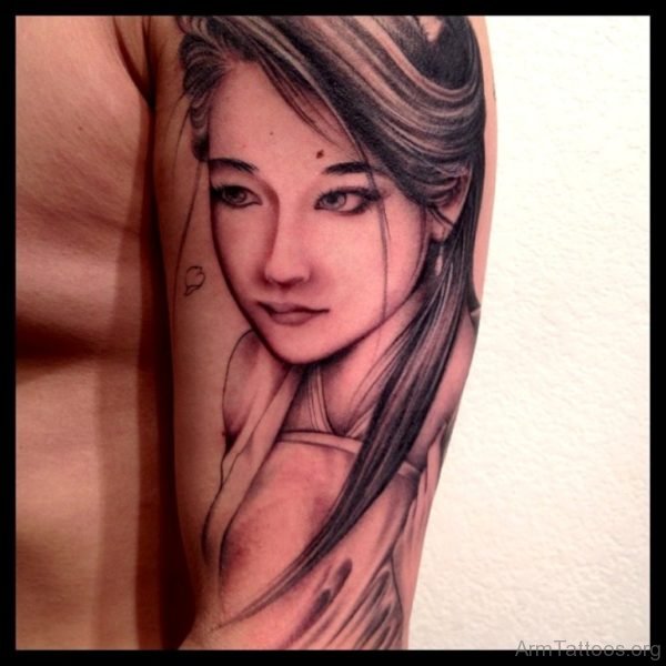 Awesome Girl portrait tattoo On Bicep 