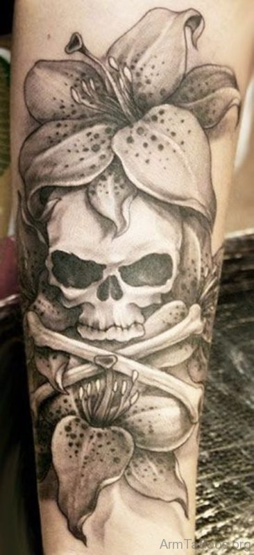 Awesome Grey Ink Lily And Skull Tattoo On Arm