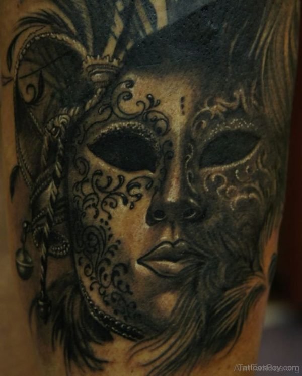 Black Ink Venetian Mask Tattoo