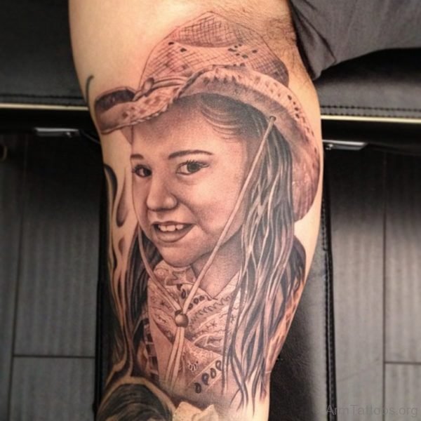 Beautiful Grey Ink Girl Portrait Tattoo On Bicep 