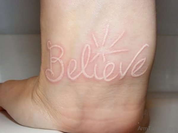 Believe Word White Ink Tattoo On Wrist
