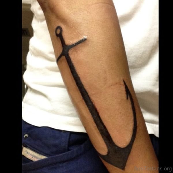 Big Black Ink Cross Anchor Tattoo On Arm