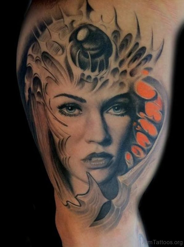 Biomechanical Gothic Girl Tattoo On Bicep 