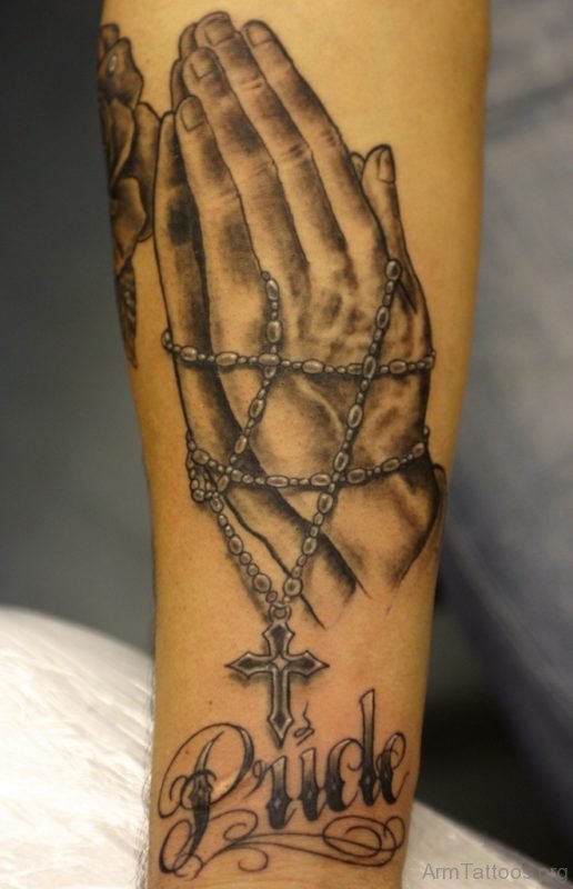 Black And Grey 3D Rosary Cross In Hand Tattoo Design For Forearm