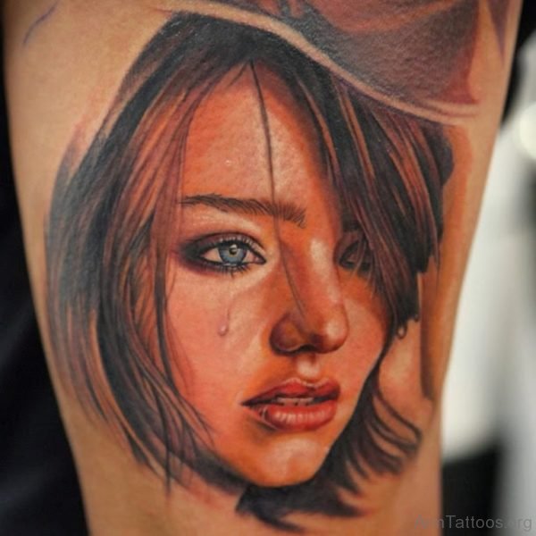 Black And Red Crying Girl Portrait Tattoo On Arm 