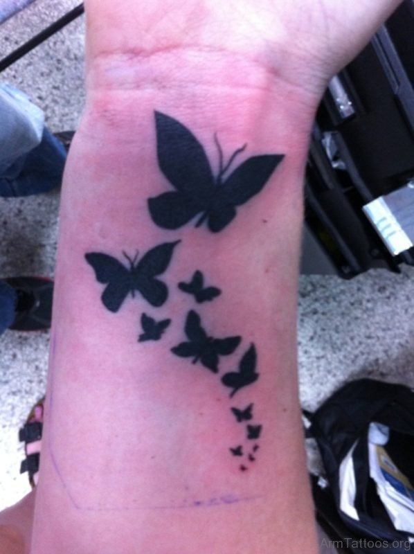 Black Butterfly Tattoo On Wrist