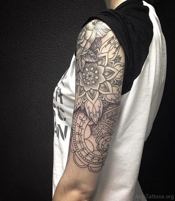 Black Flowers Tattoo On Arm 