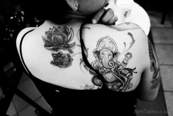 Black Ganesha Tattoo On Back Shoulder