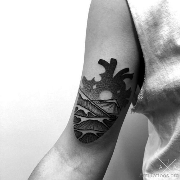 Black Heart Tattoo On Arm 