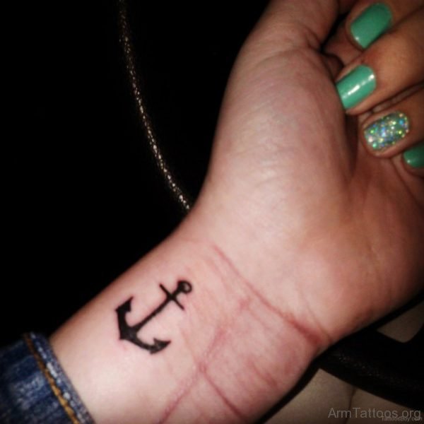 Black Ink Anchor Tattoo On Wrist 