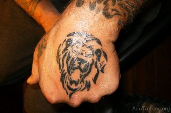Black Ink Leo Tribal Tattoo On Hand