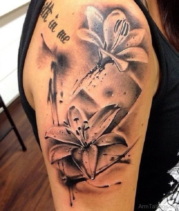 Black Ink Lily Tattoo On Half Sleeve