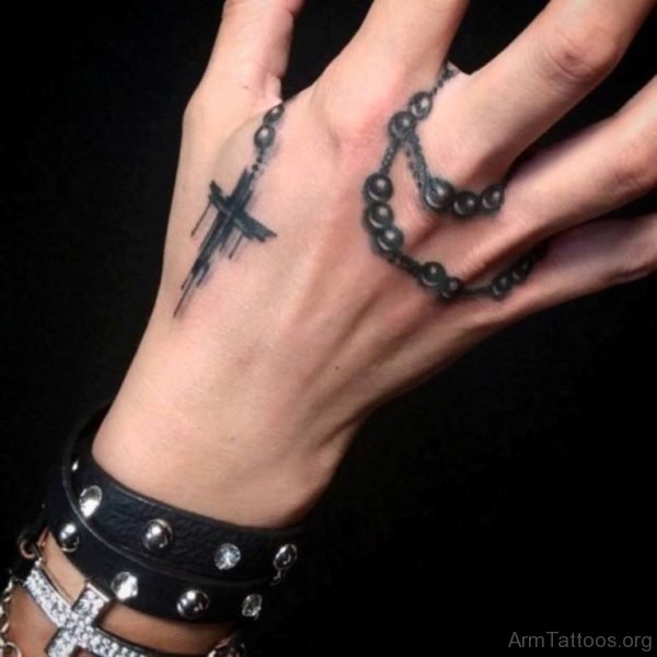 Black Ink Rosary Tattoo On Right Hand