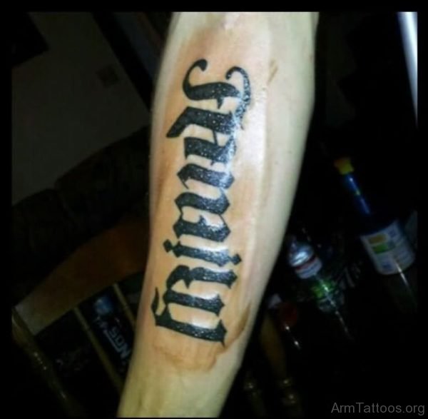 Black Inked Ambigram Tattoo