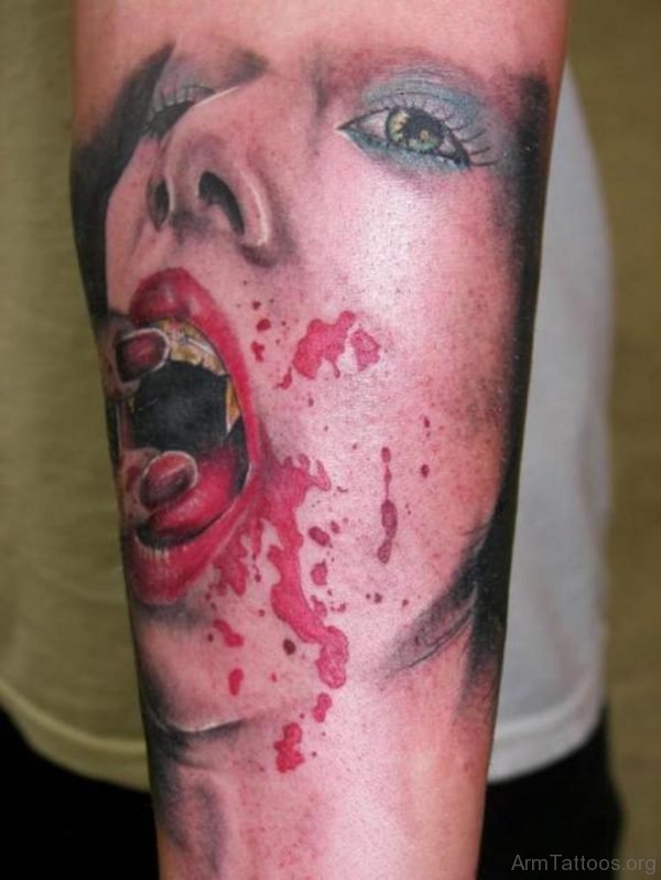 Bleeding Vampire Hourglass Tattoo On Arm 