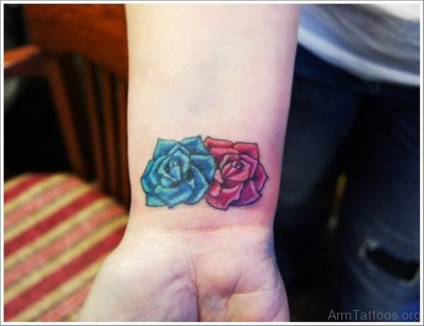 Blue And Roses Tattoo On Wrist 