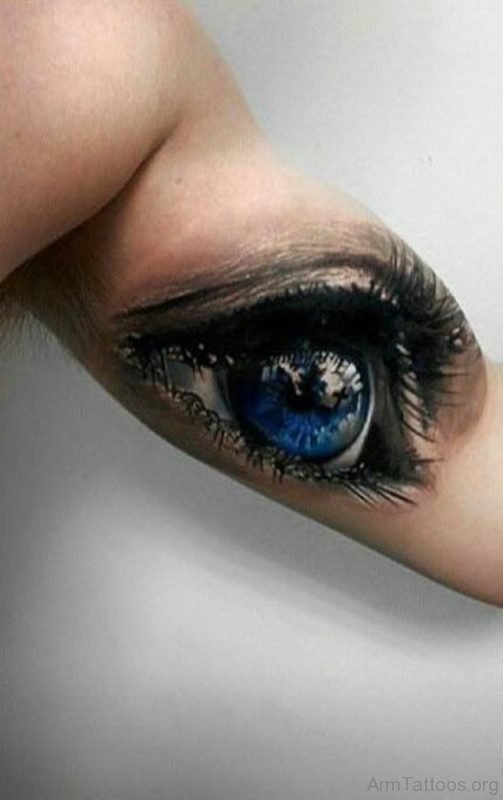 Blue Eye Tattoo On Arm 