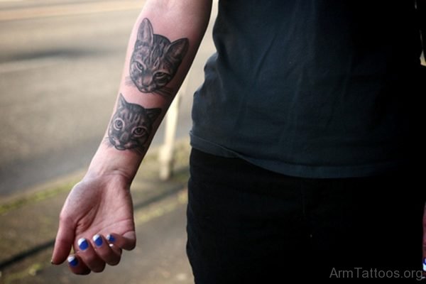 Cat Face Tattoo On Wrist