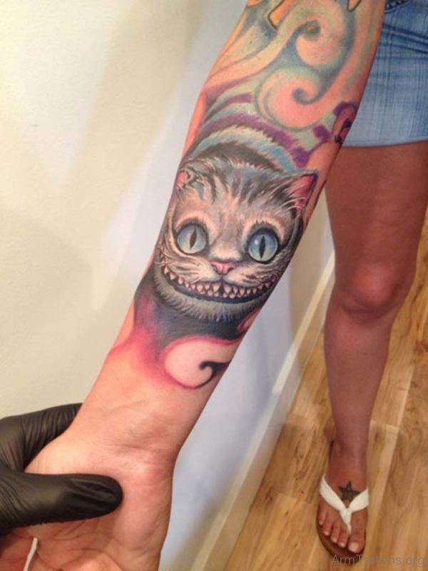 Cheshire Cat Tattoo On Right Forearm