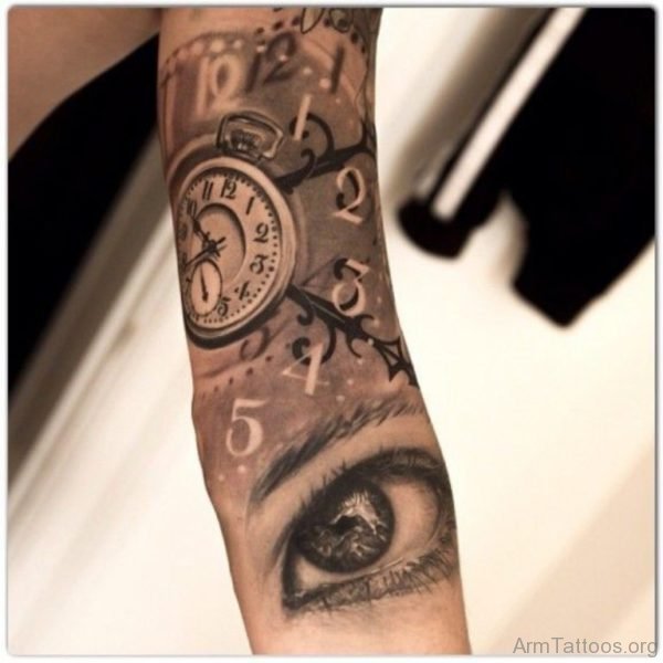 Clock And Eye Tattoo On Arm 