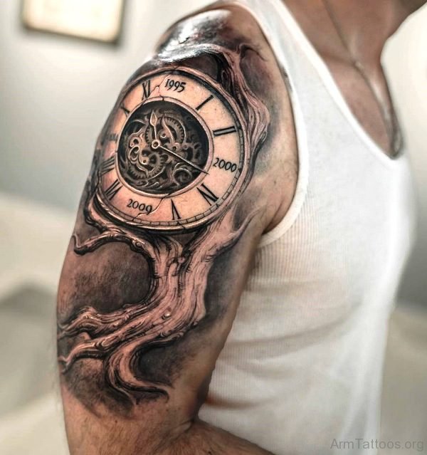 Clock Tree Tattoo On Arm 