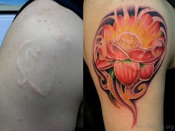 Colored Flower Tattoo On Arm 