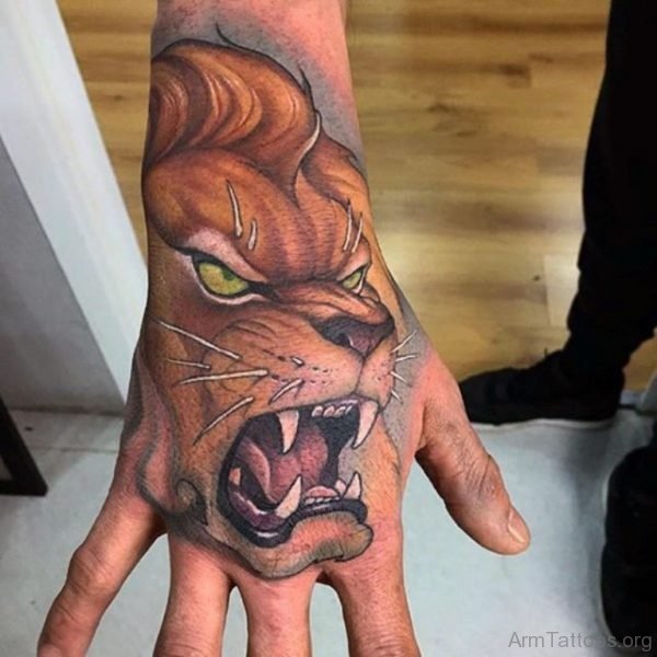 Colored Lion Tattoo On Hand