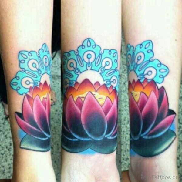 Colored Lotus Tattoo On Arm 
