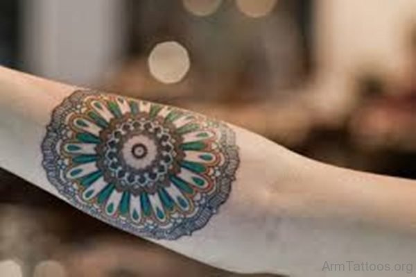 Colored Mandala Tattoo On Arm Image