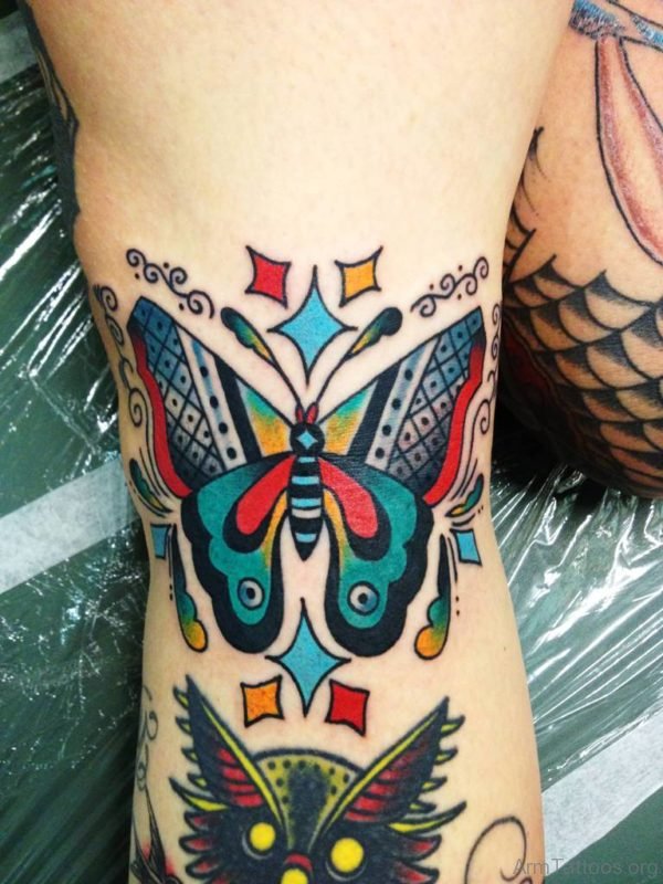 Colorful Traditional Butterfly Tattoo On Arm