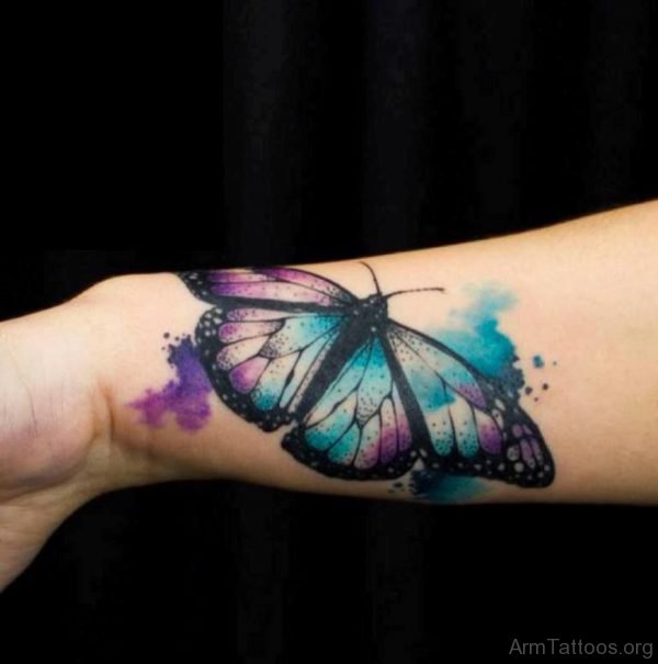 Colorful Watercolor Butterfly Tattoo On Left Arm