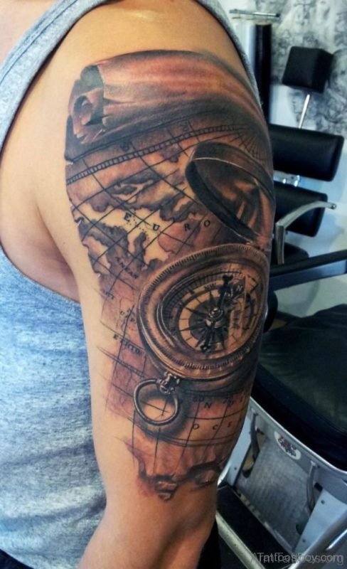 Compass And Map Tattoo On Bicep