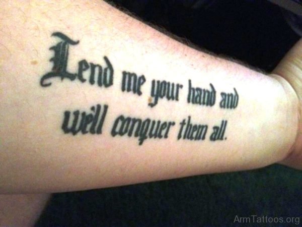 Cool Black Lettering Tattoo On Arm 