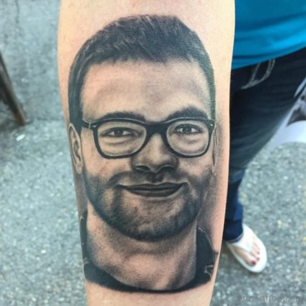 Cool Portrait Tattoo On Wrist 