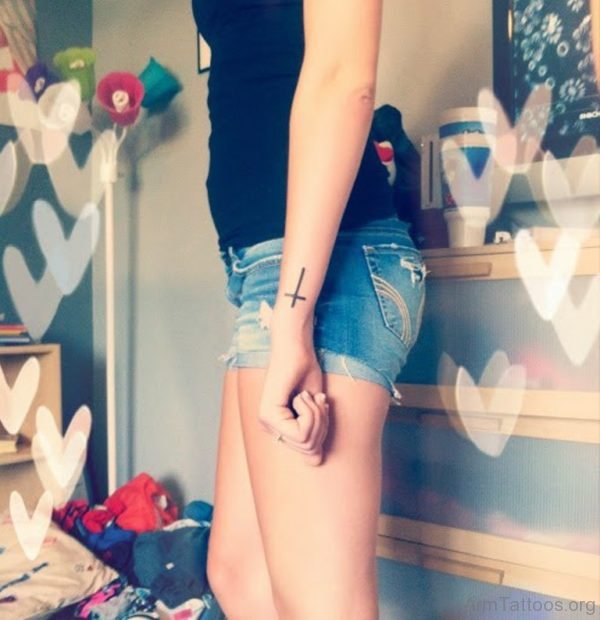 Cross Tattoo On Girl Arm