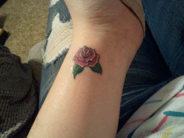 Cute Little Rose Tattoo On Wrist 