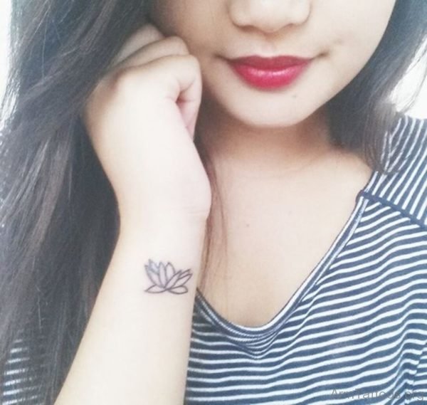 Cute Lotus Tattoo On Arm 