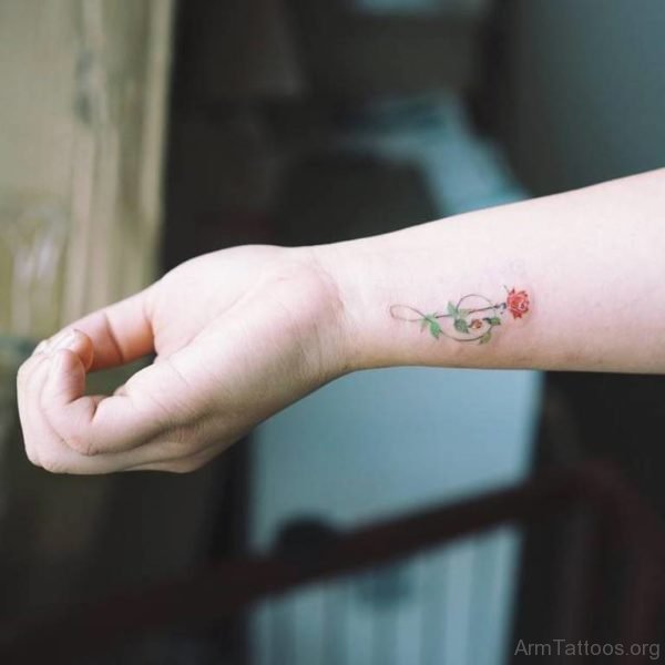 Cute Small Rose Tattoo On Wrist 