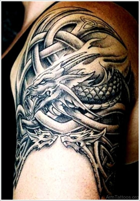 Dargon And Celtic Pattern Arm Tattoo